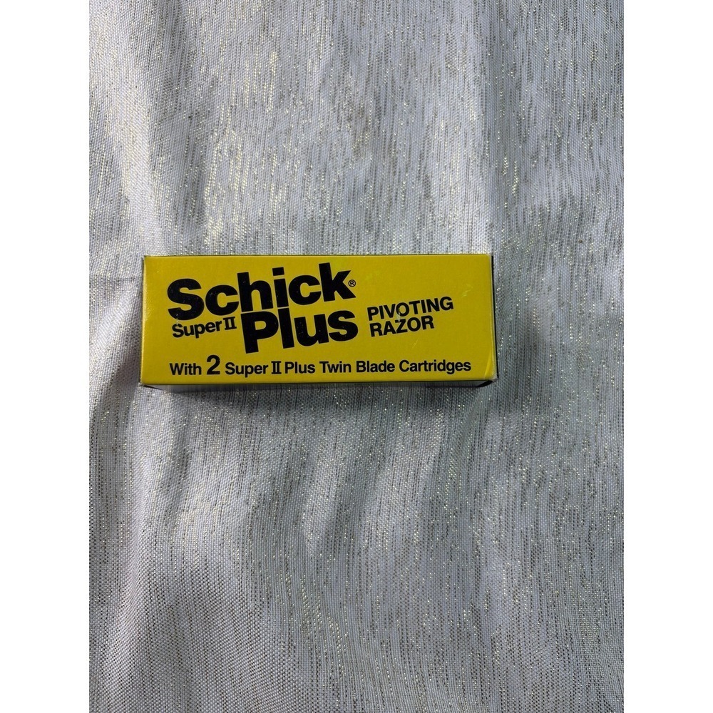 vintage Schick Super II Plus Pivoting Razor with 2 Super II Plus Twin Blade Cart